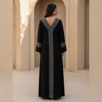 represent Black Traditional Thobe with White Geometric Woven