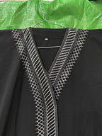 represent Black Traditional Thobe with White Geometric Woven