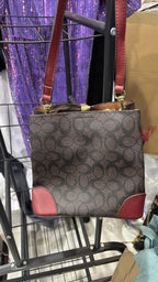 COACH LEATHERWARE Monogram Bucket Crossbody Bag with Red Tri