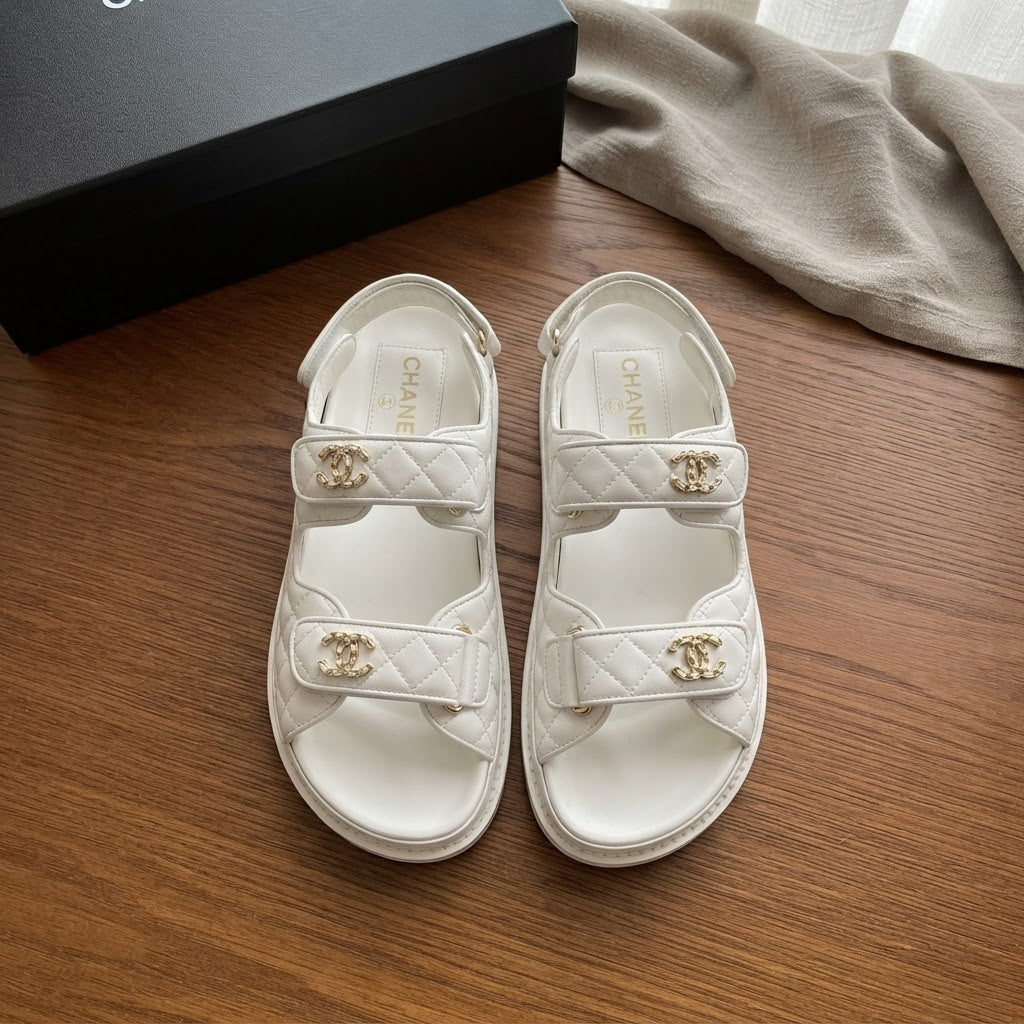 CHANEL White Quilted Double-Strap Flat Sandals with Gold Log