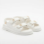 CHANEL White Quilted Double-Strap Flat Sandals with Gold Log