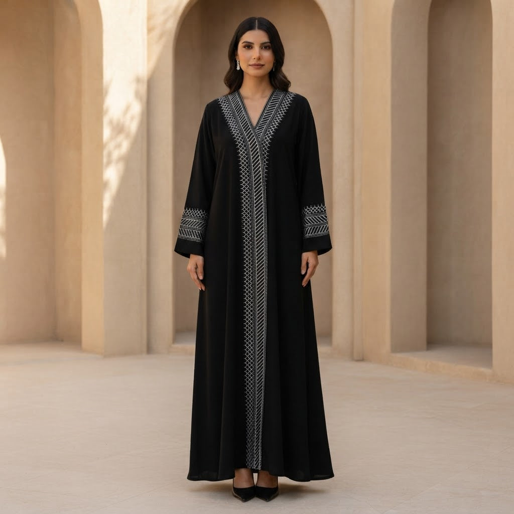represent Black Traditional Thobe with White Geometric Woven