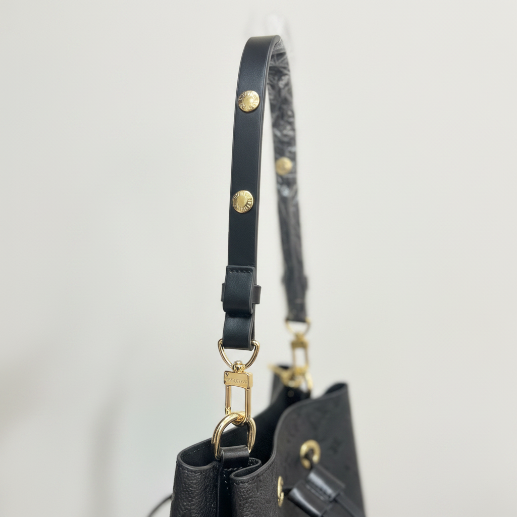 LOUIS VUITTON Women's Black Embossed Drawstring Bucket Bag