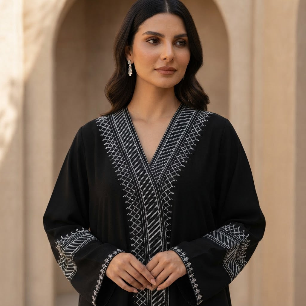 represent Black Traditional Thobe with White Geometric Woven