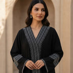 represent Black Traditional Thobe with White Geometric Woven