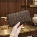 [WearU Generated:premium_master] Michael Kors Dark Brown Monogram Rectangular Zip-Around Wallet – front view