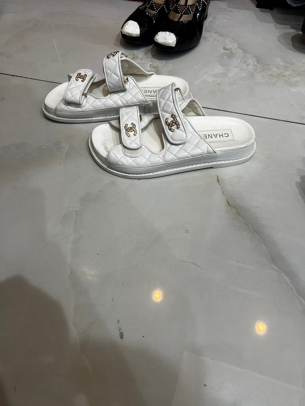 CHANEL White Quilted Double-Strap Flat Sandals with Gold Log
