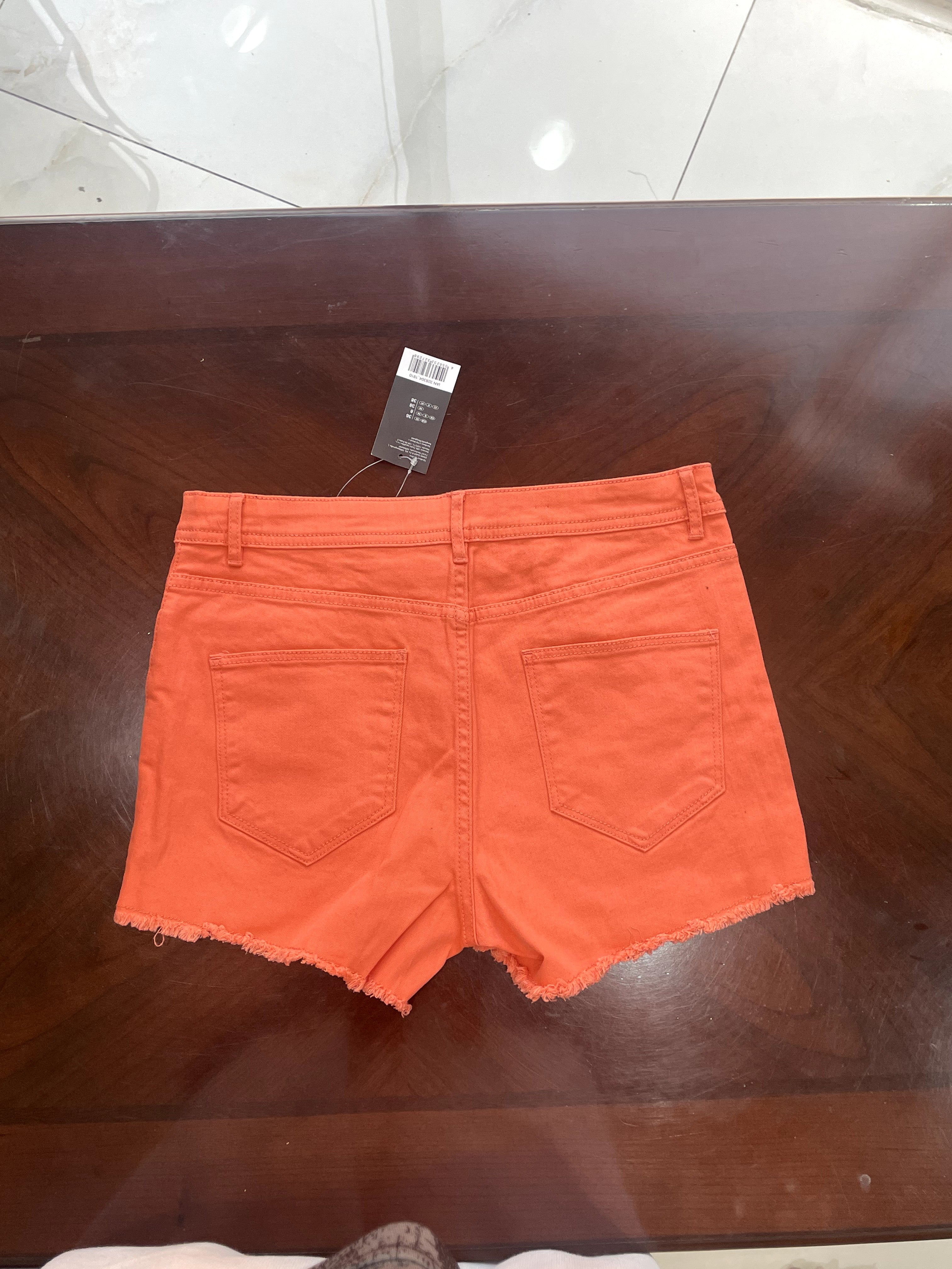 Vibrant Orange Raw Hem Denim Shorts
