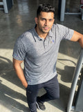 [WearU Generated:premium_master] Under Armour Heather Grey Synthetic Polo Shirt – premium master