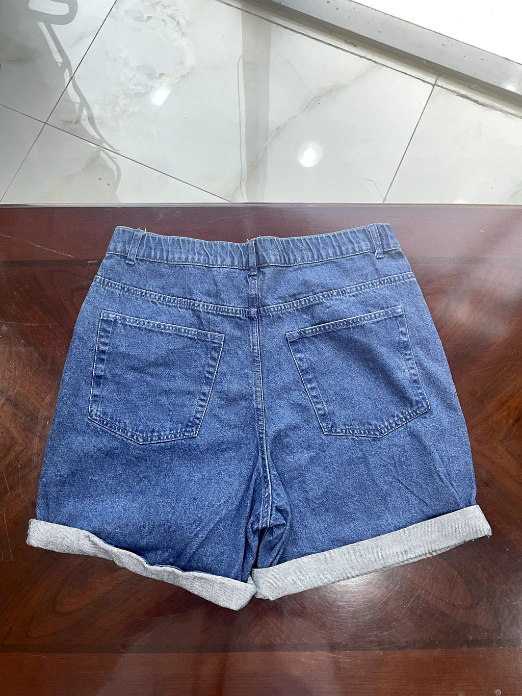 Mid-Wash Blue Denim High-Rise Shorts with Cuffed Hem