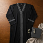 represent Black Traditional Thobe with White Geometric Woven
