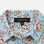 Women's Light Blue Floral Sleeveless Button-Up Blouse