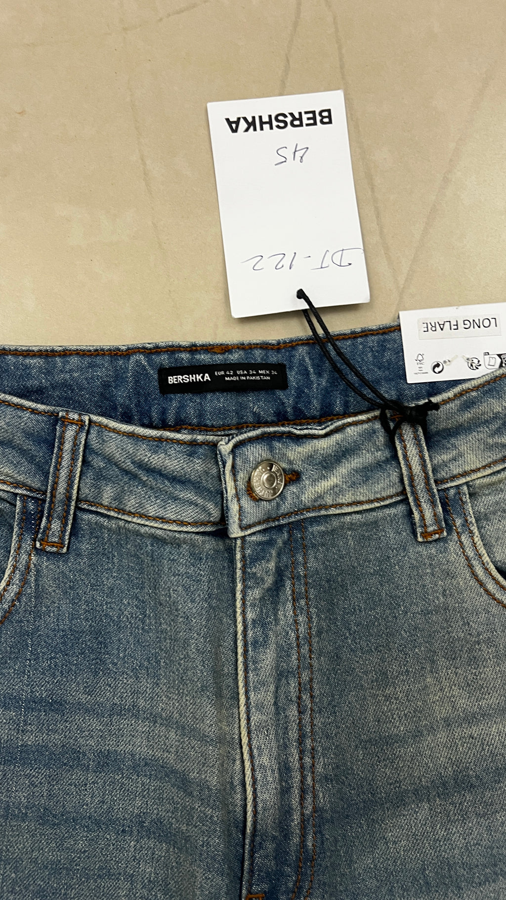 Bershka Bershka Mid-Washed Blue Long Flare Jeans with Raw He