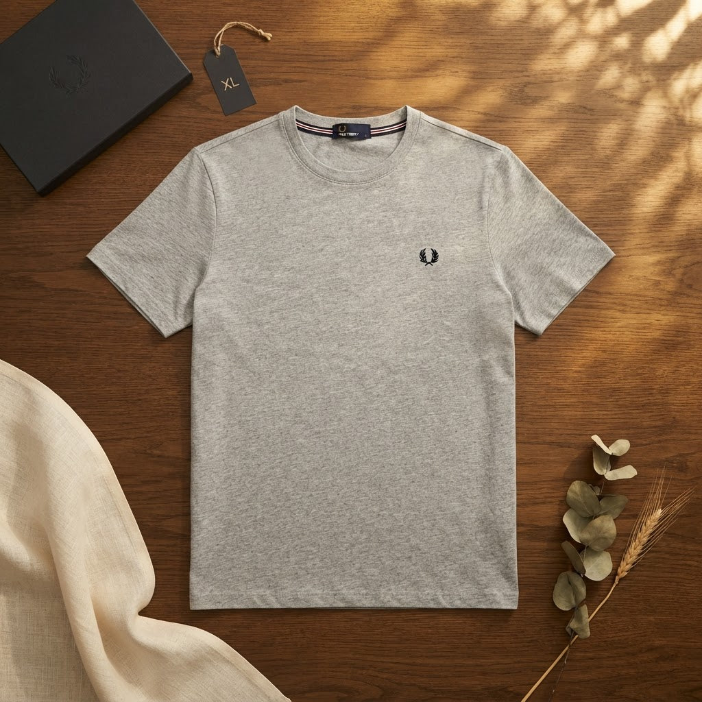 [WearU Generated:merch_flat_lay] Fred Perry Heather Grey Marl Cotton Jersey T-Shirt – merch flat lay