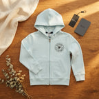 [WearU Generated:merch_flat_lay] Guess Pale Blue Cotton Regular Fit Zip Hoodie – flat lay view