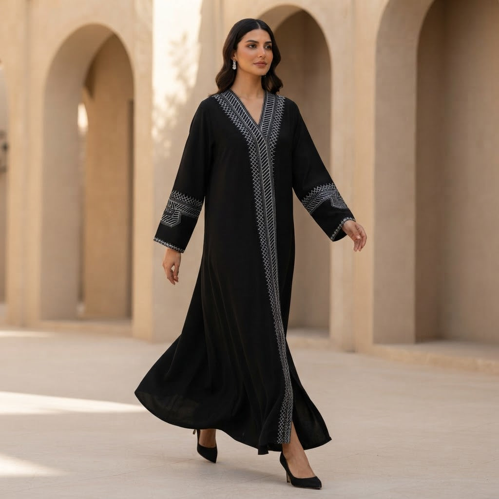 represent Black Traditional Thobe with White Geometric Woven