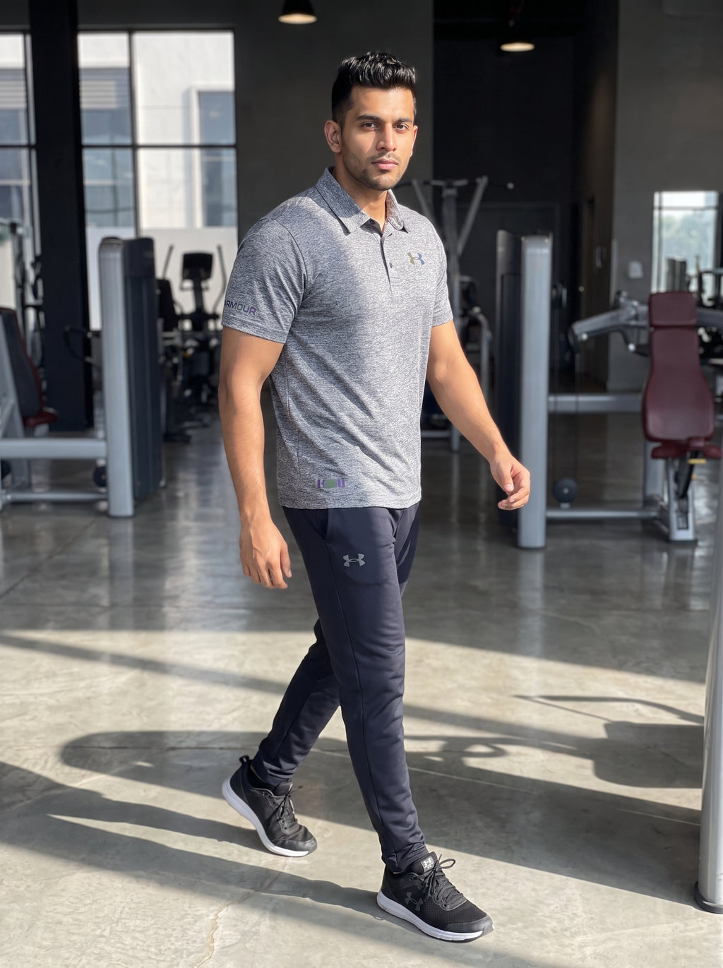 [WearU Generated:campaign_2] Under Armour Heather Grey Synthetic Polo Shirt – campaign 2