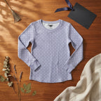 [WearU Generated:merch_flat_lay] OshKosh Periwinkle Blue Polka Dot Long-Sleeve Crew Neck Top – flat lay view