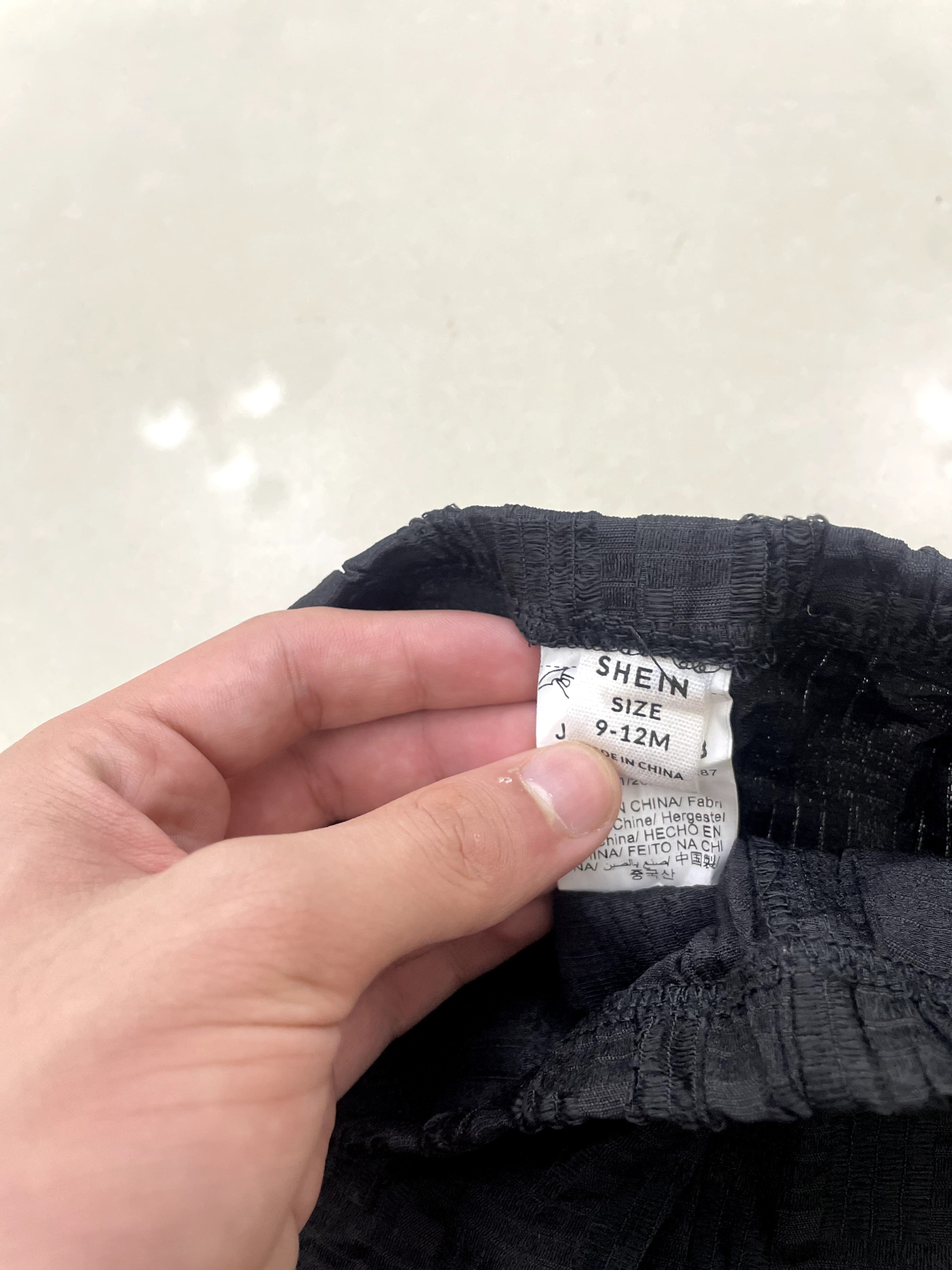 SHEIN Black Smocked Waist Infant Shorts