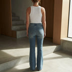 BERSHKA Mid-Blue High-Rise Long Flare Jeans with Raw Hem